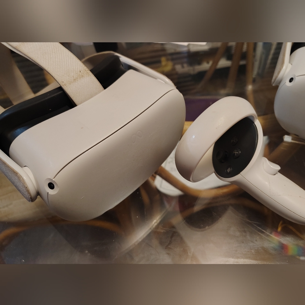2 VR Headsets and 3 Controllers